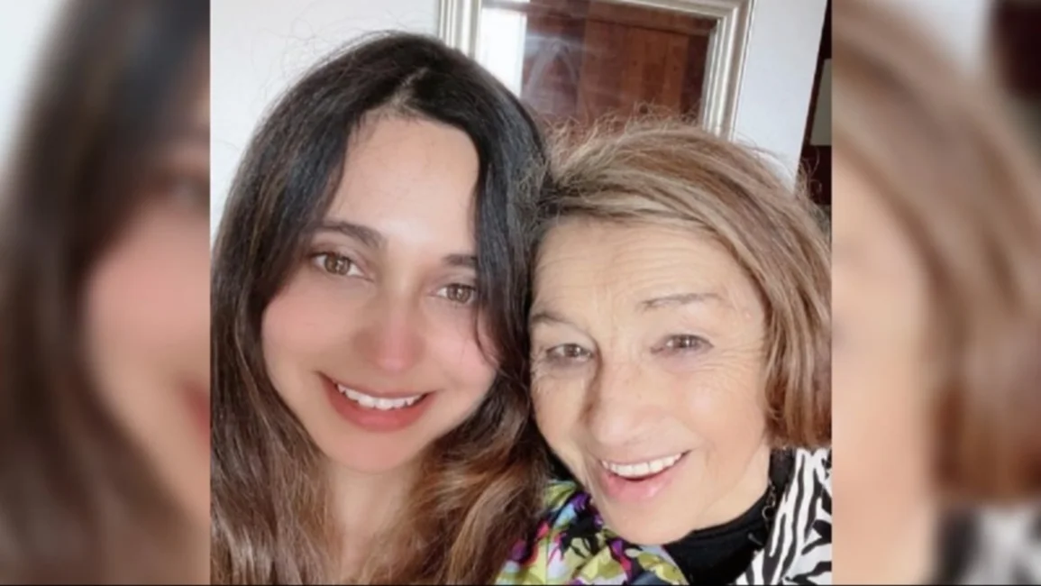 María Elcira.